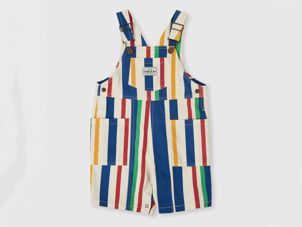 Multicolored striped overalls on a light gray background