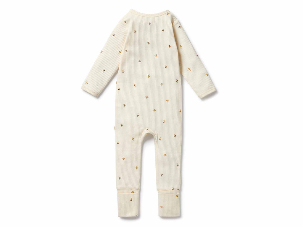 Baby onesie with bee pattern on a white background