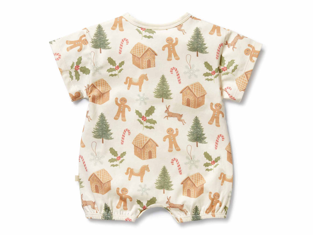 Baby romper with Christmas-themed print on a white background