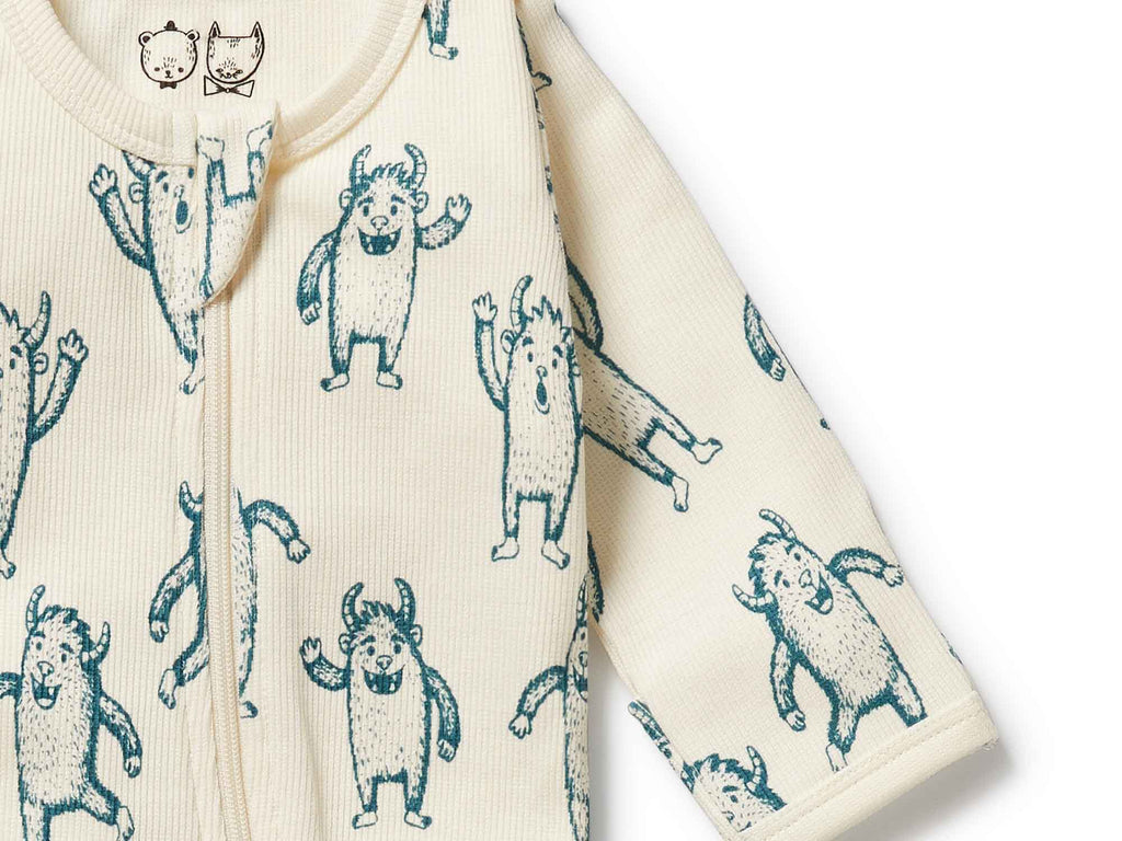 Baby onesie with yeti design on a white background