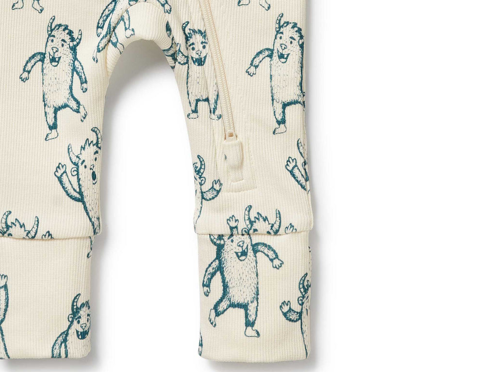 Baby romper with yeti pattern on a white background