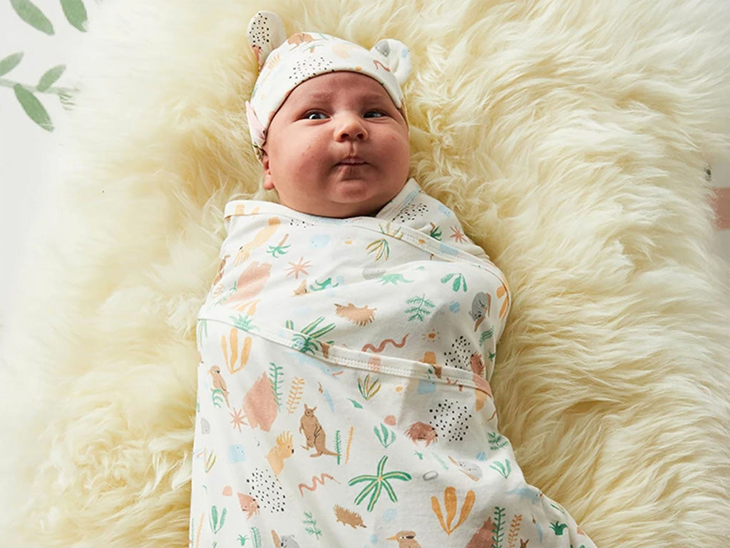 Baby swaddled in Halcyon Nights outback dreamers wrap